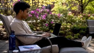Student planning college courses on laptop