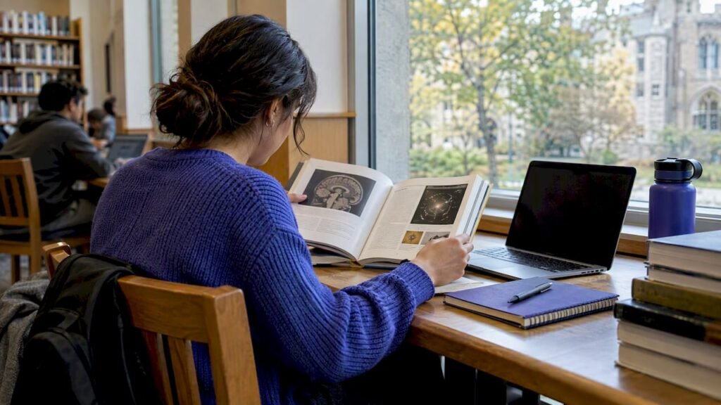 Student comparing possible college majors